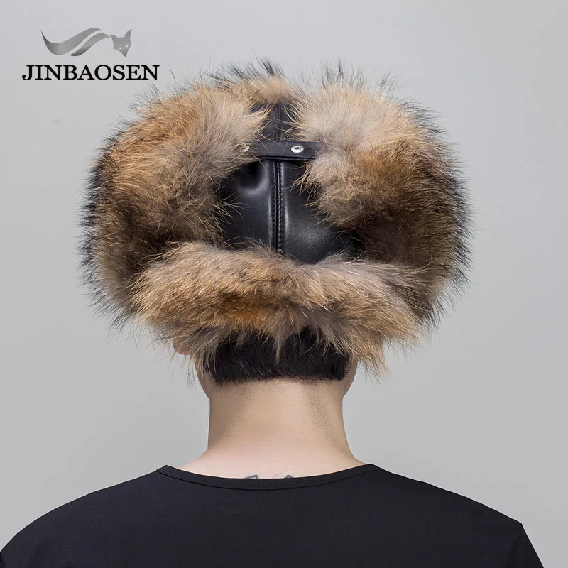 JINBAOSEN русская Кожаная Шапка-бомбер мужская зимняя шапка наушники мужские шапки из натурального меха енота Черная шапка с лисой