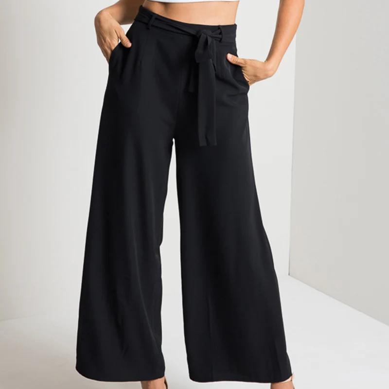 брюки палаццо ralph lauren. широкие шифоновые брюки. широкие свободные брюки. брюки с защипами женские с чем носить фото с подиумов 2020. летящие штаны.