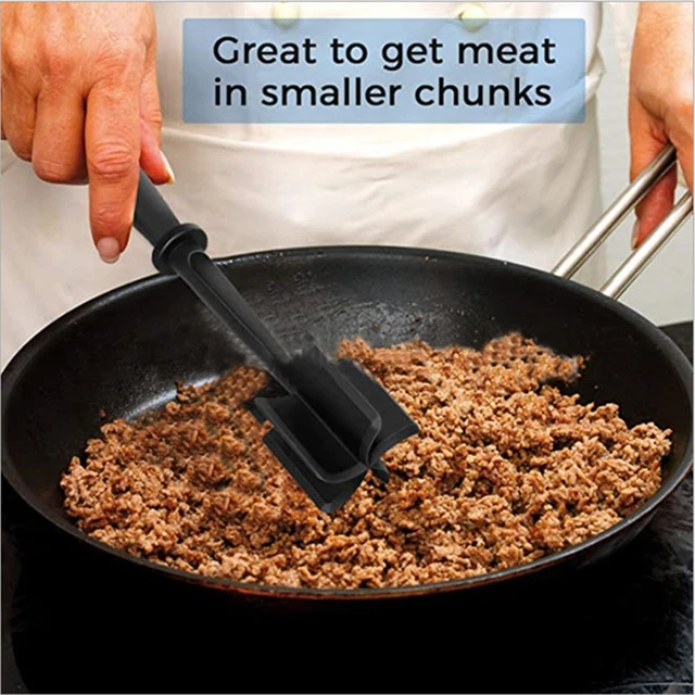 Use Your Potato Masher To Break Up Ground Meat in the Skillet