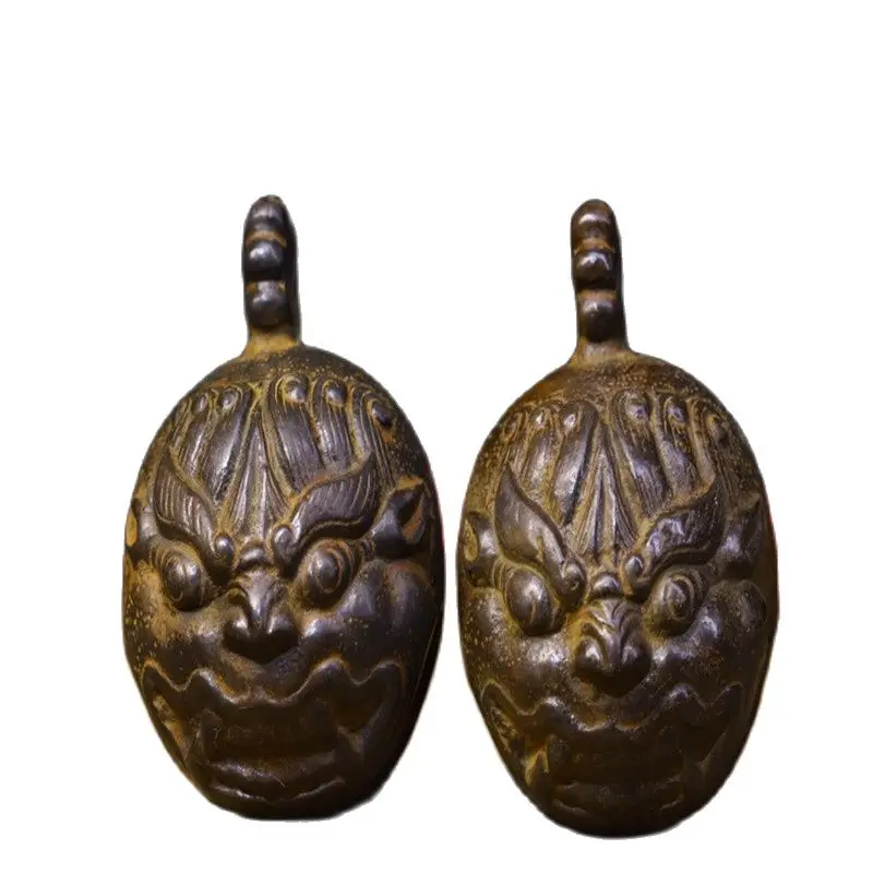 

Early Collection of Nepalese Tiger Head Bells