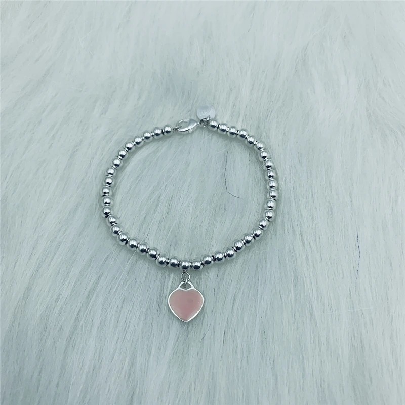 

SHINETUNG S925 sterling silver, pink heart-shaped enamel tag 4mm ball bead bracelet, 1: 1 high-end women's jewelry with logo.