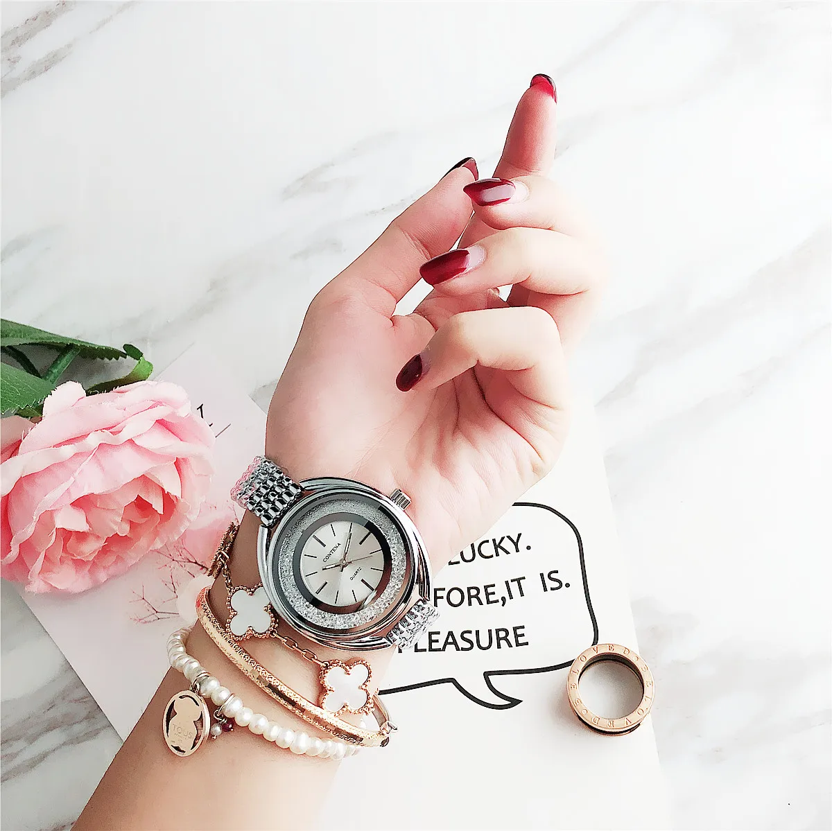 

7224SYD Unique simple striped bear will move the dazzling steel belt lady's watch