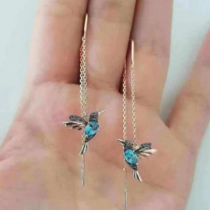 lange vlinder ketting oorbellen in zilver