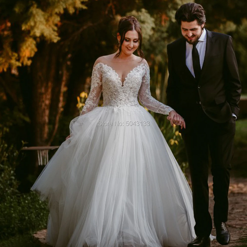 

Sexy Illusion V Neck Long Sleeves Princess Wedding Dresses 2019 Lace Applique A Line Soft Tulle Wedding Bridal Gowns New