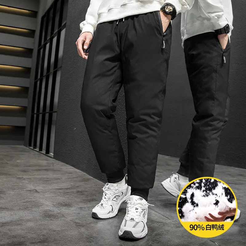 

2020 Winter Down Pants Men's Outer Wear Warm Velvet Thick Slim Cotton Pants Trendy Fashion Trousers White Duck Down Pants Men