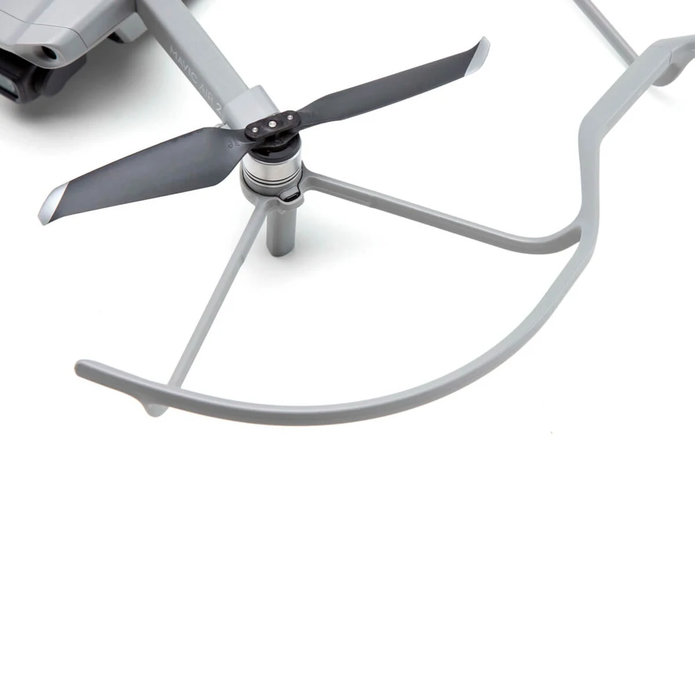 Garde d'hélice Air2S d'origine en place, protection robuste pour le drone DJI contre les chocs.