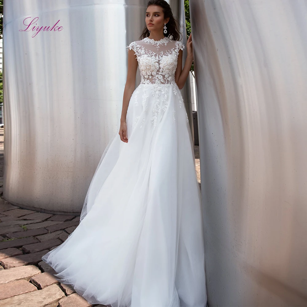 

Liyuke 2019 Married A-line Wedding Dress Lace Appliques O-neck Beading Sequined Cap Sleeves Illusion Customized Floor-length