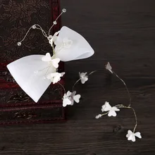 Аксессуары для волос невесты с бантом Тиара заколка белая свадебная фотостудия фото ювелирные изделия