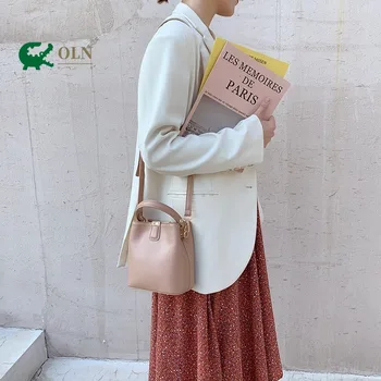 

2020 summer new women's bag portable bucket bag shoulder bag messenger bag retro solid color purses and handbags