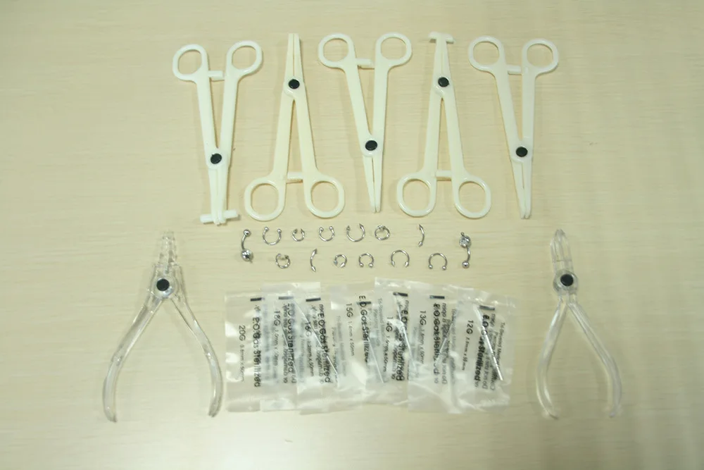 Yiwu dayi long wen shen оборудование одноразовый прокол набор пирсинг ювелирные изделия инструмент для прокола оправки