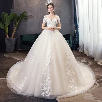 

Lllusion Elegant Long Train Wedding Dress 2020 Vestidos De Novia Pearls Real Photo Plus Size Princess Brid Lace Flowers Sequined