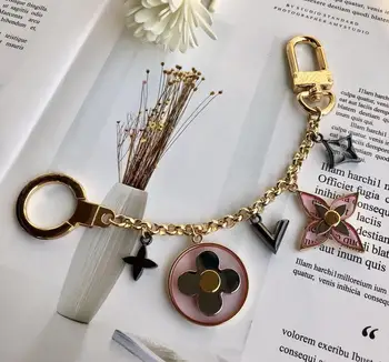 

Luxury Good Luck Clover Metal Key Chain High-End Fashion Brands Key Chain Flower KeyRing Women Bag Charm Pendant Car Accessories