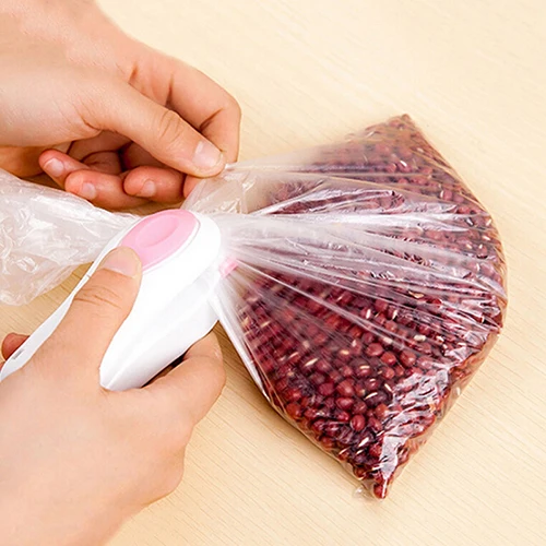 Hand-press sealing machine household food bag heat sealing machine Portable mini snack plastic bag laminating machine