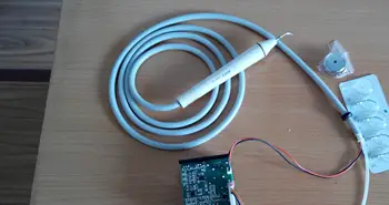 

Ultrasonic Scaler with Built-in Pull-out Handle Accessories Dental Chair with Built-in Ultrasonic Scaler Kit 5 Cutter Heads