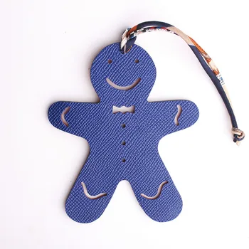 

Designer Famous Brand Luxury Real Silk Strap Cute Gingerbread Man Genuine Leather Keychain Pendant Women Backpack Bag Charms