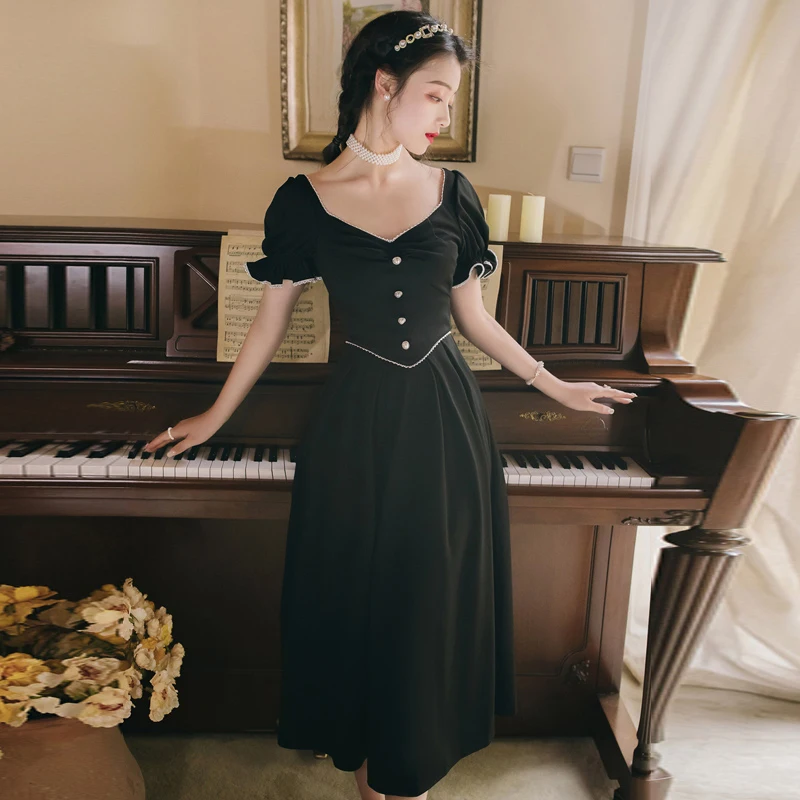 2020 summer new Japanese dress retro temperament fairy lotus leaf sleeve V-neck mid-length dress Hepburn style black dress