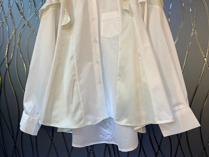 Early autumn new women's Lapel irregularly stitched long sleeve loose shirt 814