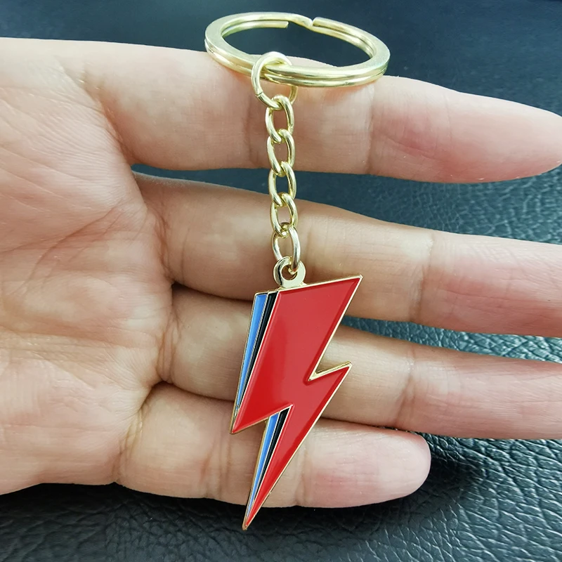 Rock ‘no roll music lovers! God give this Red and Blue Lightning Bolt keychain as a gift to us (1)