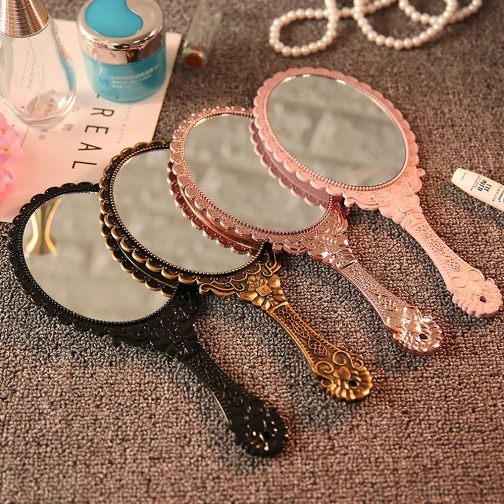 

Vintage Handhold Makeup Pink Repousse Floral Oval Round Cosmetic Hand Held Mirror With Handle Home Decoration Mirror