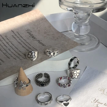 HUANZHI 2020 New Korean Vintage Daisy Flower Black Heart Glaze Sad Face Silver Color Metal Rings for Women Couple Ring Jewelry