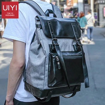 

UIYI fashion trend Korean tide backpack men canvas+PU leather stitching backpack men college style school bag Man pack rucksack