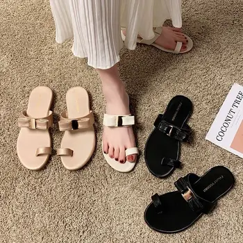 

2020 Spring New Korean Version of the round Head Wild Flat tao zhi Fairy Wind Field Sandals and Slippers Female