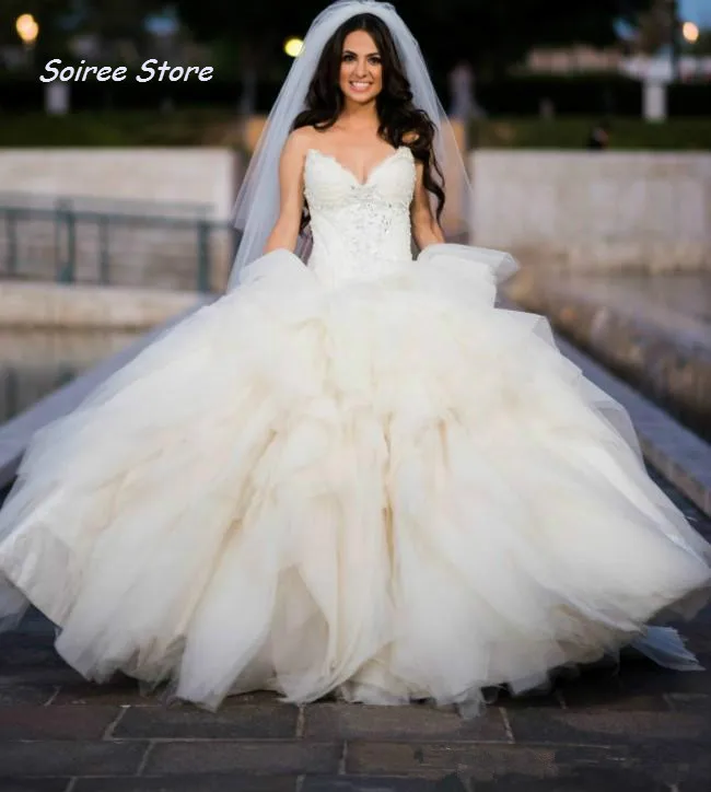 

Romantic Puffy Ball Gown Wedding Dresses For Bride Sweetheart Crystal Corset Wedding Dress Country Boho Ruffles Arabic Gowns