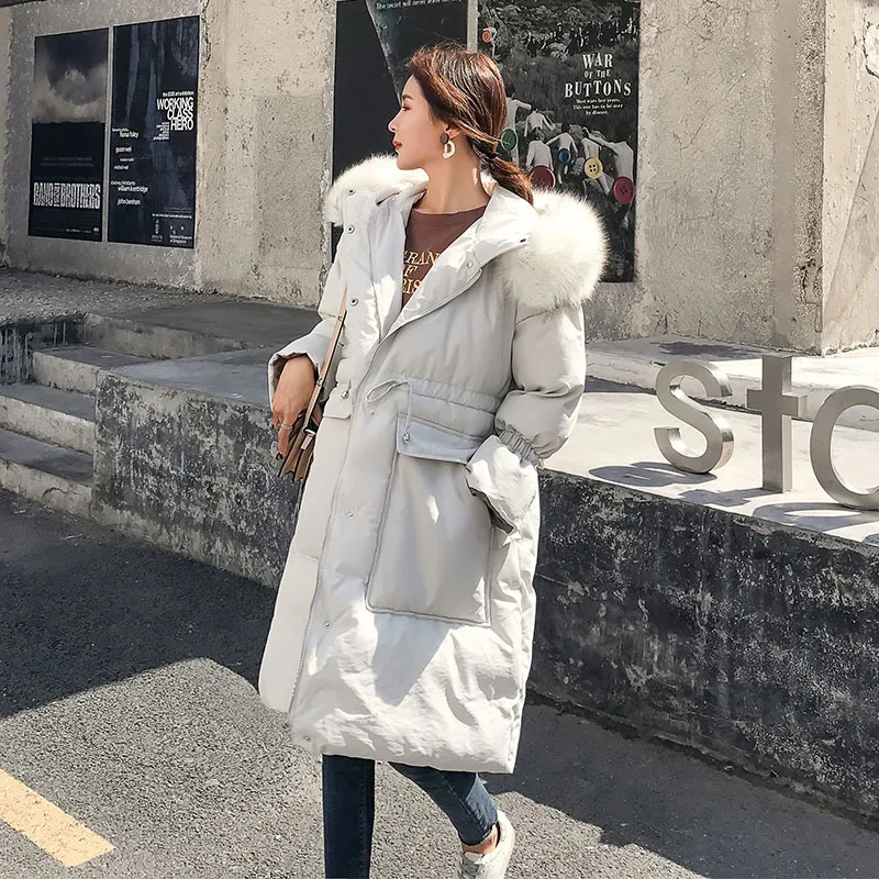 

Photo Shoot Korean-style Waist Hugging Lace-up Big Hemline down Coat Women's Off-white Large Pocket over-the-Knee Fur Collar Hoo