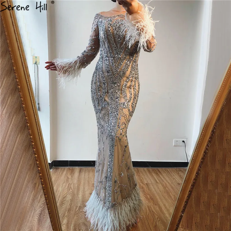 

Dubai Luxury Grey Nude Mermaid Evening Dresses Long Sleeve Feathers Sequined Evening Gowns 2019 Serene Hill LA60932