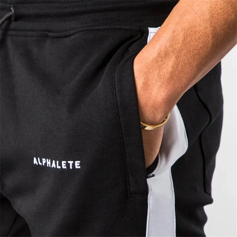 ALPHALETE, мужские спортивные штаны для бега, лоскутные штаны, для тренажерного зала, для бодибилдинга, длинные штаны, для мужчин, для фитнеса, спортивная одежда, высокое качество, спортивные штаны