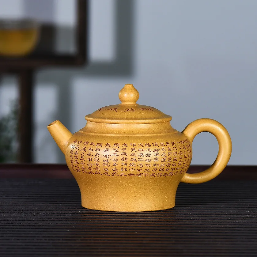 

2807 Yixing Clay Teapot Entirely Handmade Raw Ore Gold Segment Mud Buddha Pot Heart Sutra Yixing Clay Teapot 150 Ml Ball Hole
