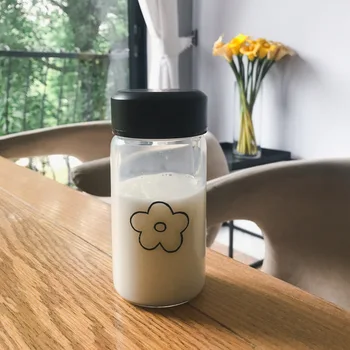 

Ins Small Flower Water Bottle Creative Transparent Heat Resistant Glass with Lid 300ml Capacity Portable Outdoor Juice Milk Cups