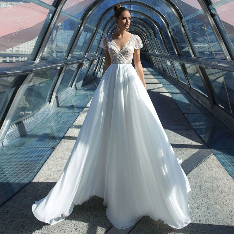 

Elegant Sheer V-neck Chiffon Wedding Gowns 2020 Short Sleeve Sequined Beading Court Train Backless A-line Bridal Dresses