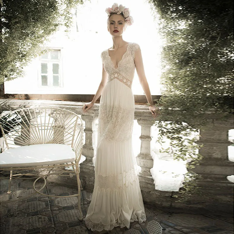 Bohemen Kant Backless Trouwjurken V-hals Kapmouwtjes Vintage See Through Bruidsjurken Luxe Kralen vestidos de novia 2015 Bohemen Kant Backless Trouwjurken V-hals Kapmouwtjes Vintage See Through Bruidsjurken Luxe Kralen vestidos de novia 2015