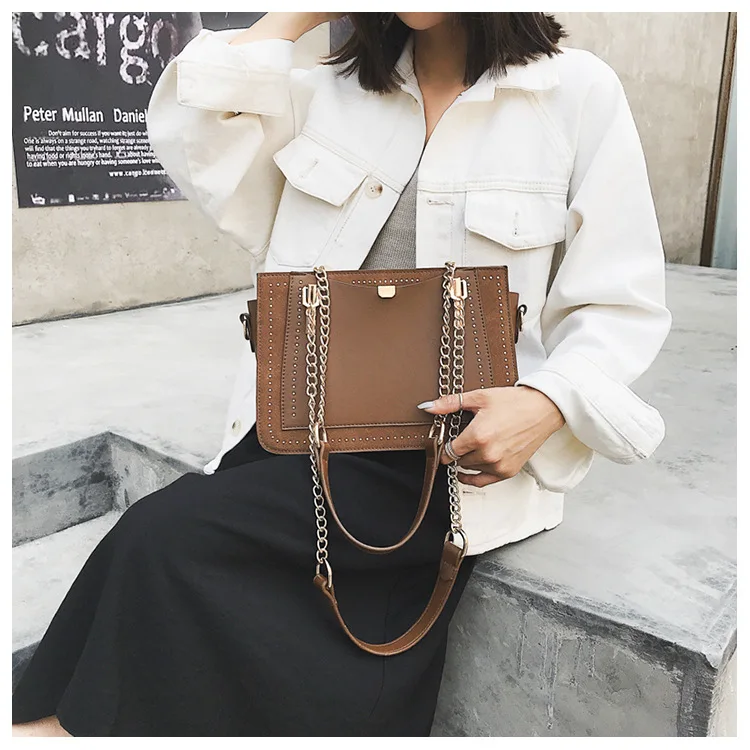 

Women's Korean version of grinding three-dimensional large square rivet single shoulder oblique span bag