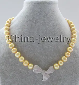 

P7341-18" 10-11mm natural gold round freshwater pearl necklace - Bowknot pendant
