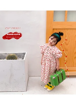 

POLKA DOT DRESS -Puritan collar dress with ruffle trims and short sleeves. Featuring a snap-button at the front, Polka dot print