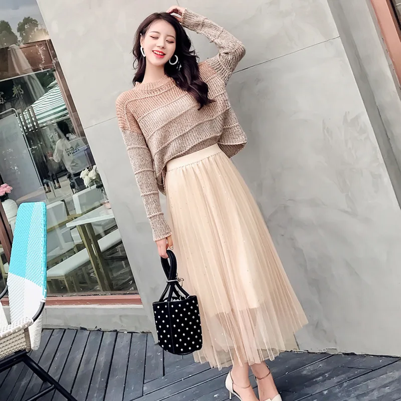 

Suit Color Knitting Sweater + Medium Length Money Half Body Gauze Skirt Two Piece Suit