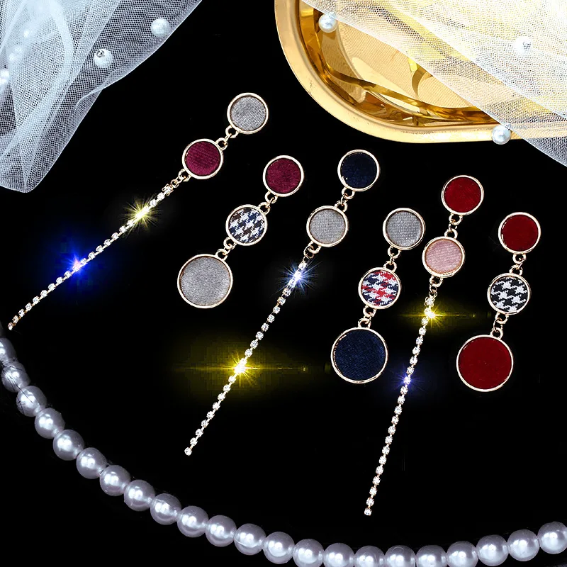 

Korean fashion hundred asymmetrical long tassel earrings female autumn and winter velvet earrings in Europe and America