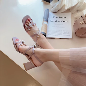 

Sandals women's summer 2020 new genuine leather fairy wind flower word buckle thick heel with skirt high heel ladies sandals Z71