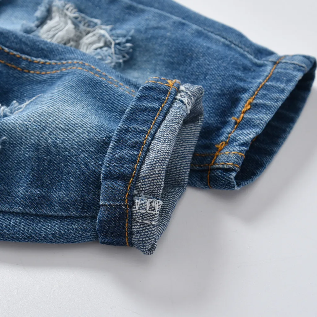 Детские модные однотонные джинсы для маленьких девочек и мальчиков длинные штаны г. Модные новые рваные джинсы для мальчиков и девочек, брюки W1217