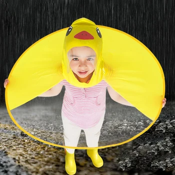 

Cute Raincoat Cartoon duck Kids Rain Coat UFO Children Umbrella Hat Magical Hands Free Tops Boys And Girls Windproof Poncho Baby