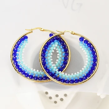 

Stainless steel earrings with high-grade rice beads braided by hand