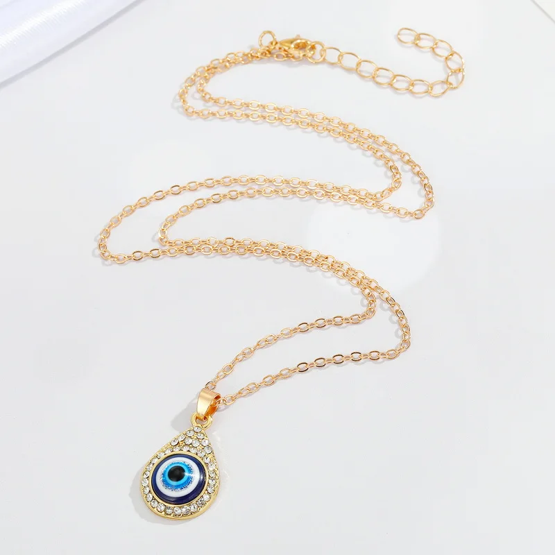 Evil Eye pendant necklace on gold chain