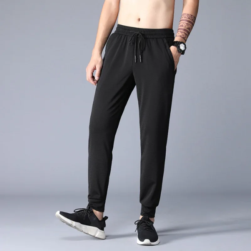 

Summer Thin Section Silky Mesh Quick-Dry Casual Sports Pants Men Air Conditioner Hollow out Viscose Loose-Fit Breathable Summer