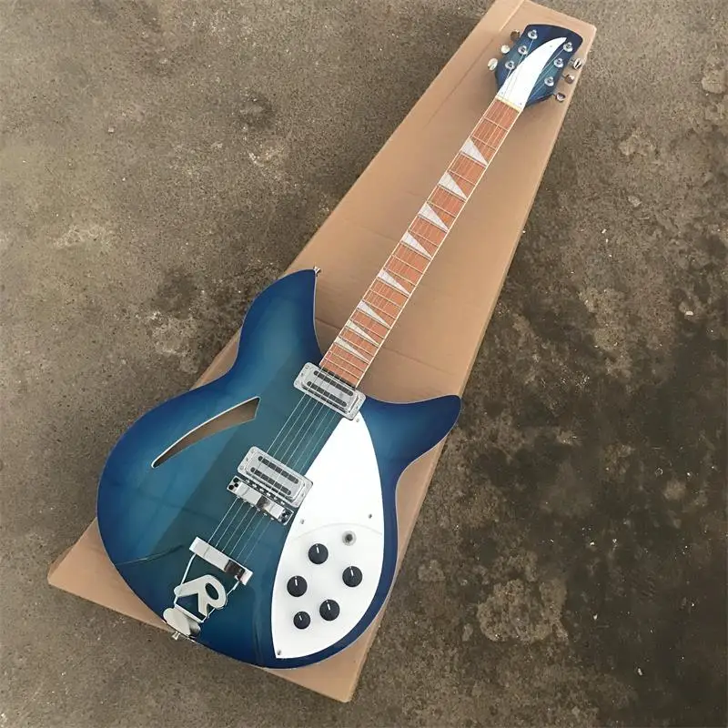 Guitarra azul oceano de 6 cuerdas dos salidas, diapasón de palo de rosa Envio