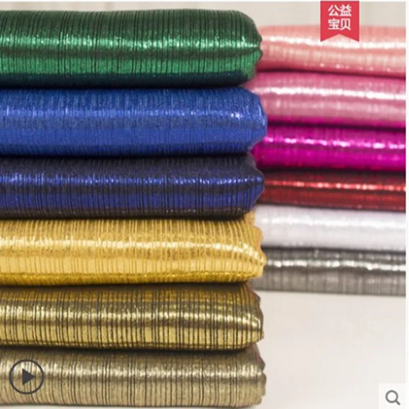

Laser Symphony clothing fabric knit elastic bronzing silver shiny fabric Bright silk pumping bronzing stretch fabric