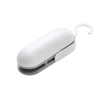 

Mini Bag Sealing Machine ABS Hand-held hot vacuum sealing machine 2-in-1 sealer and cutter Portable bag sealer 1 Piece