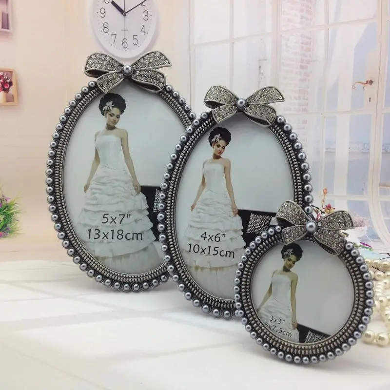 

Manufacturers Direct Selling Retro Gray Alloy Bow 3-Inch Children Frame round 6-Inch 7-Inch Bow Tabletop Wholesale
