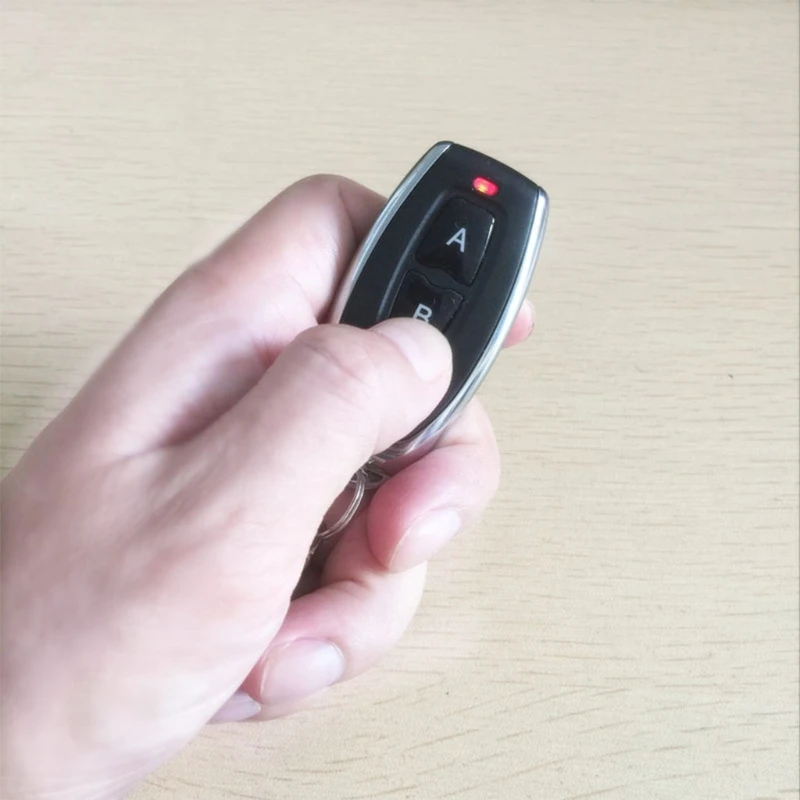 

RF 433Mhz Remote Control 1527 Learning Code For Garage Door Controller Alarm WXTA